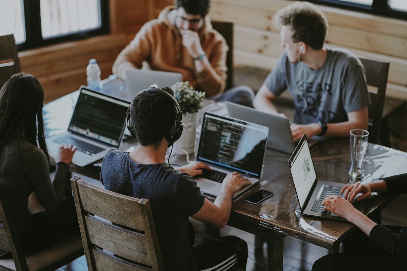 A product team planning around laptops